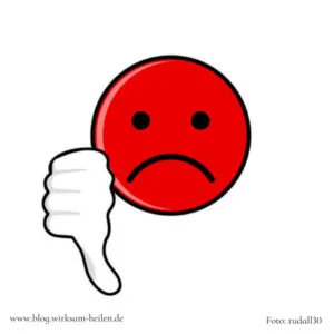 Roter Smiley traurig mit Daumen nach unten